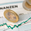 Börsenbericht und Geldmünzen